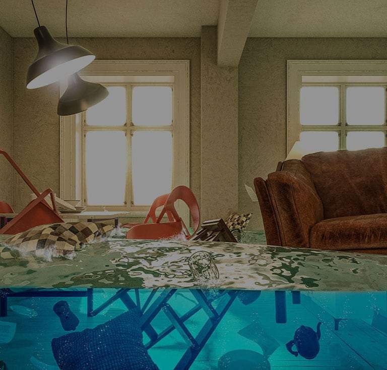 A room with various pieces of furniture floating in water that is filling the room